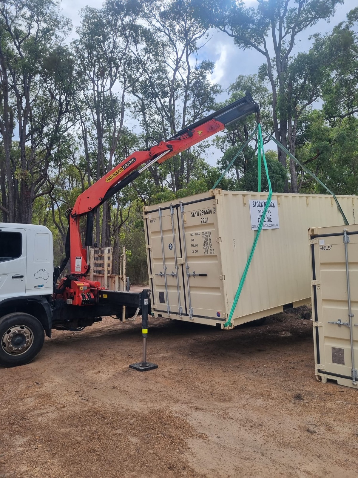 A Stock'n Lock 20ft container being craned into position on a Perth property